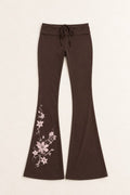 Cocoa Butterflies front catalogue flat-lay